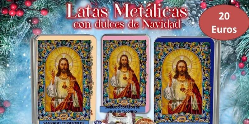 La Guardia de Honor del Coraz&oacute;n de Jes&uacute;s pone a la venta latas met&aacute;licas rellenas de dulces navide&ntilde;os de Estepa