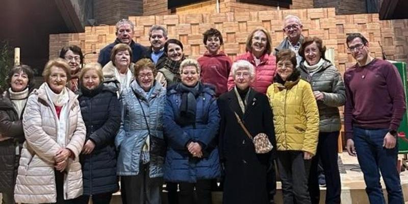 Fieles de Santa María de la Caridad participan en un curso de lectura en la Misa